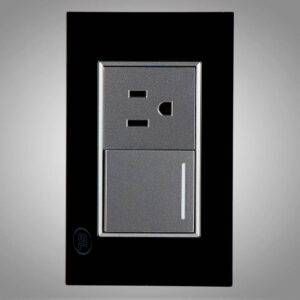 Interruptor conmutador más  receptáculo sencillo 2P + T